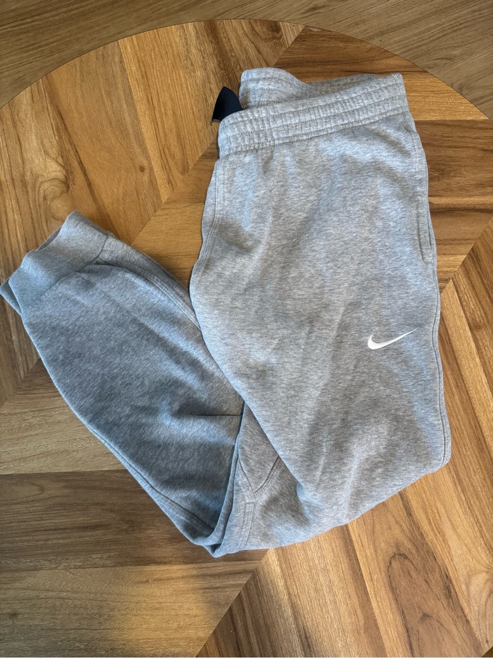 Nike Men’s Light Gray Fleece Joggers with White Swoosh